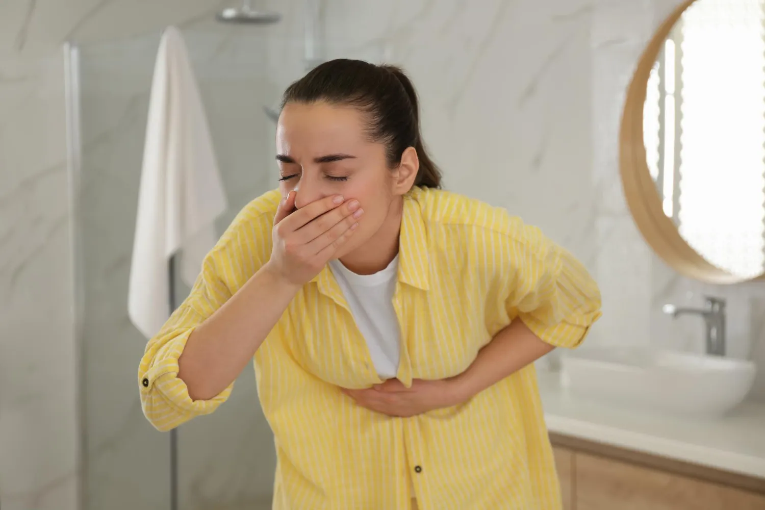 How to Stop Vomiting: Causes, Home Remedies & When to Worry